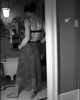 Black & white images of a bathing T-Girl beauty's shaving ritual.