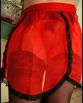 Stockings and a hot no-panty surprise visible under sheer apron.